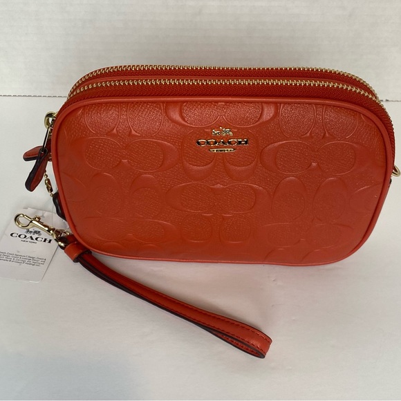 Coach camera bag with signature coated canvas detail. Shoulder/wrist strap.Coral - Picture 3 of 8